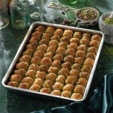 Koskeroglu Mussel Baklava with Pistachio on a Tray